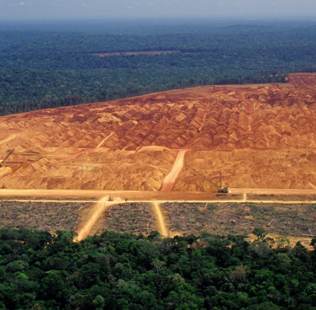 drone shot of forested area after land clearing